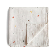 Load image into Gallery viewer, Mushie Organic Muslin Swaddle - Dinosaurs