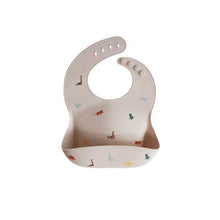 Load image into Gallery viewer, Mushie Silicone Bib - Dinosaurs