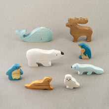 Load image into Gallery viewer, Mikheev Wooden Polar Animals Set of 8 on grey background

