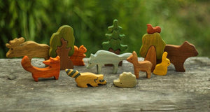 Mikheev Wooden Forest Animals Set of 9 on log 01